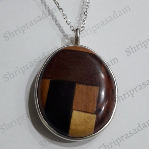 Pendant in 4 different types of wood with silver chain